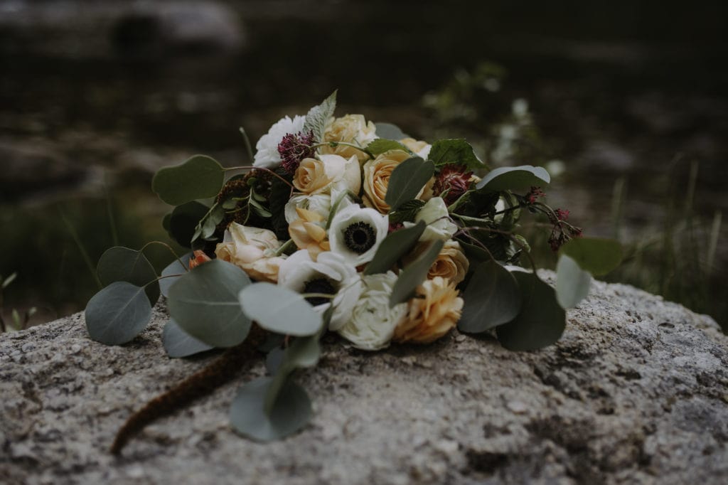 Bouquet by Montana Wedding Florist on a rock