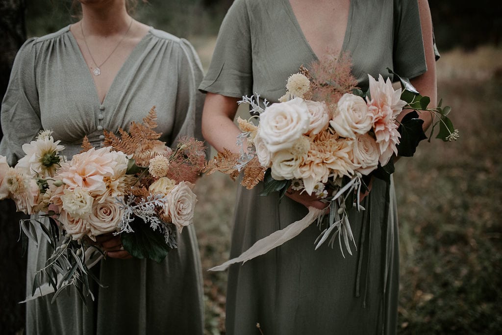 wedding flower consultation bridesmaid holding bouquets